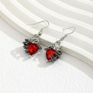 Goth Style Red Heart Earrings with a Hand Wrapping the Hearts Design